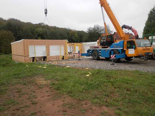 Livraison et pose sur chantier de la maison bois